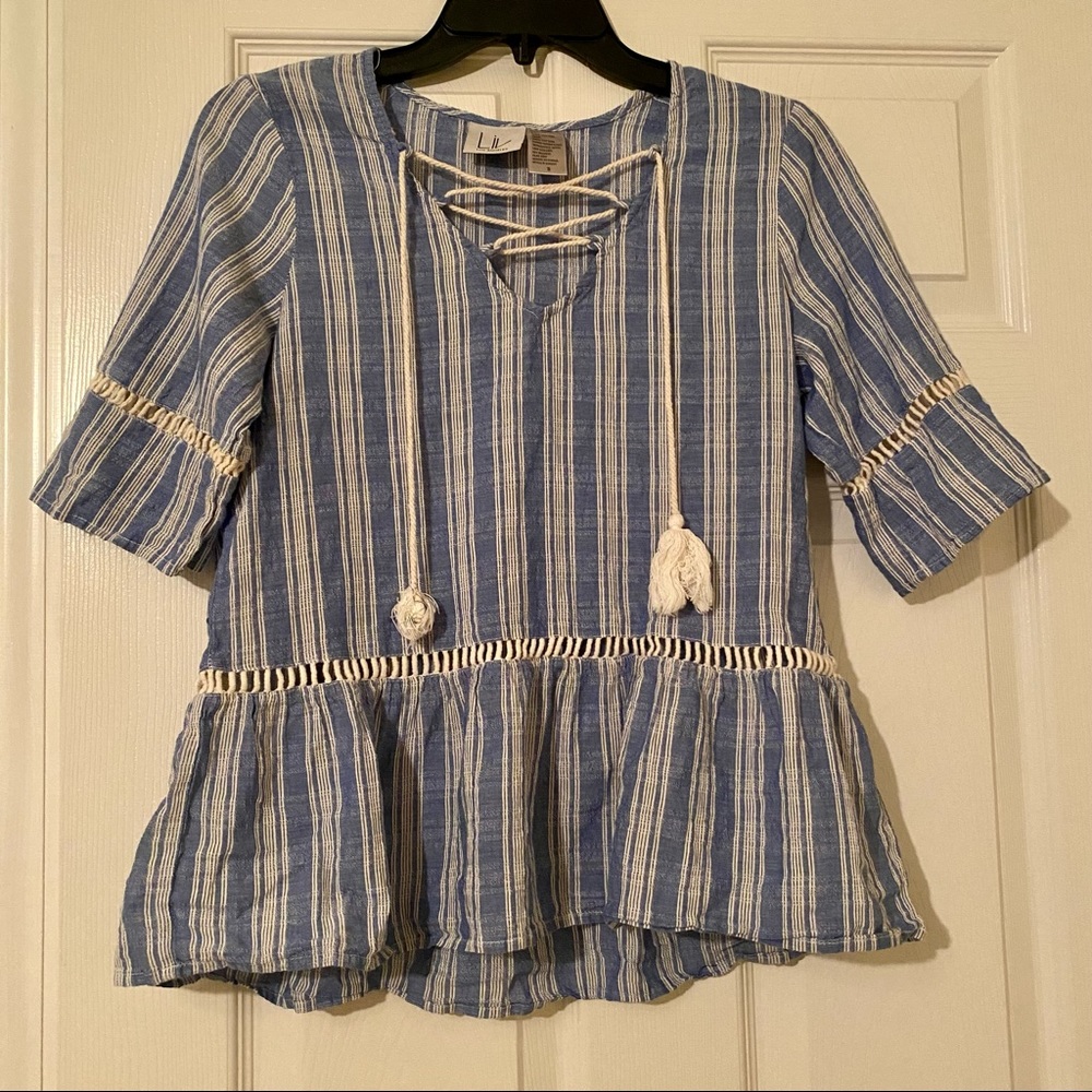 LIV LOS ANGELES BLUE AND WHITE TOP WITH CRISS-CROSS TIE AT NECKLINE.